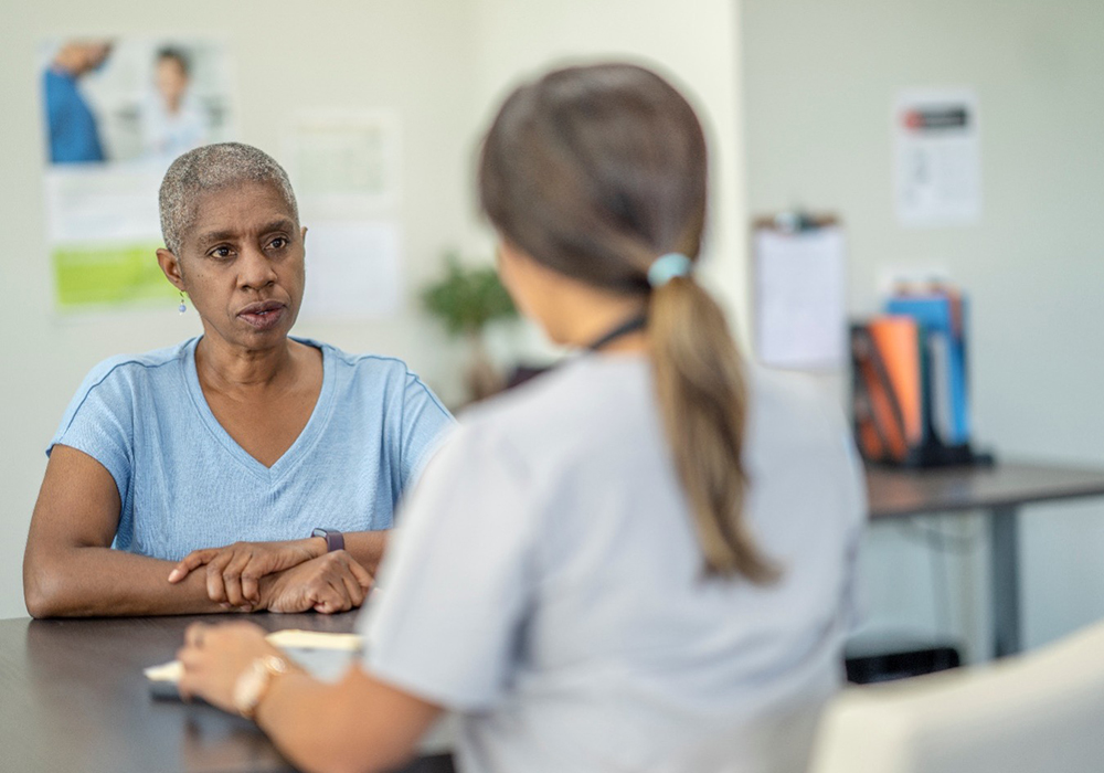Nurse talking to a patient about test results