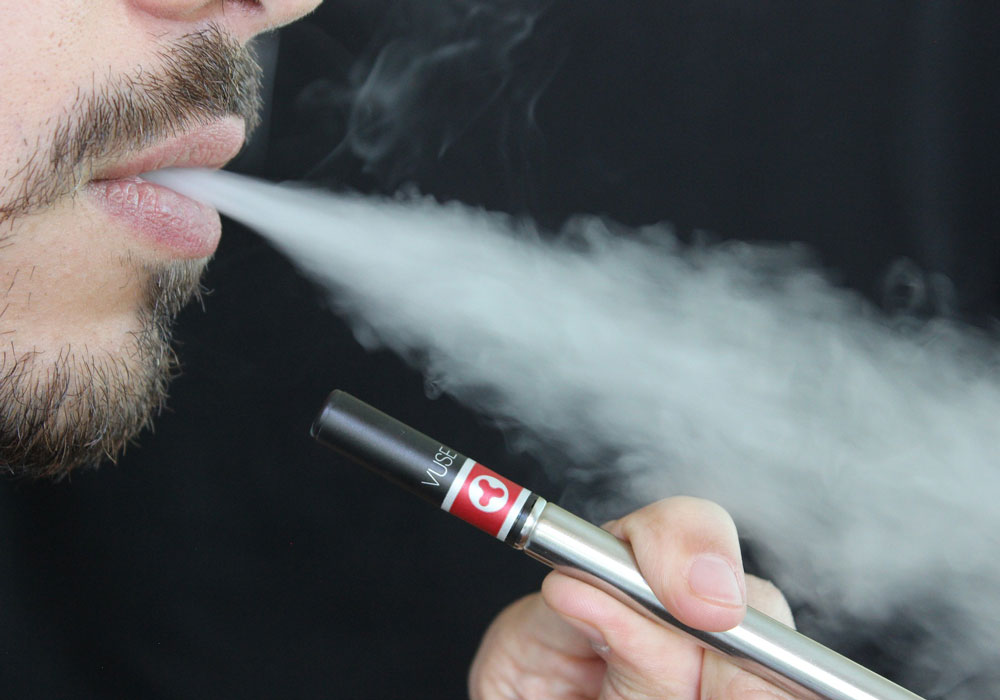 FDA Commissioner Advocates Against Smoking, New Vaping Devices