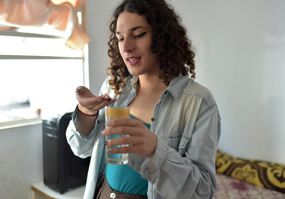 woman taking medication