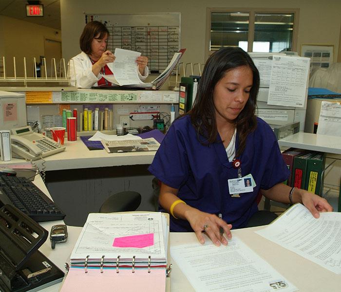 Oncology nurse practicing proper documentation